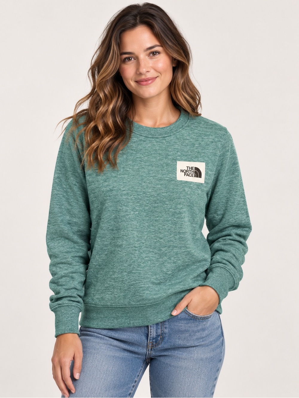 The North Face Women's Heritage Patch Crewneck Sweatshirt in Heather Teal Green